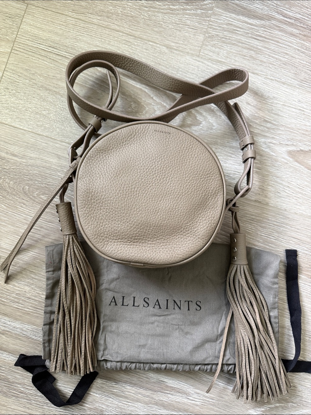 All Saints Taupe Round Leather Crossbody with Tassels